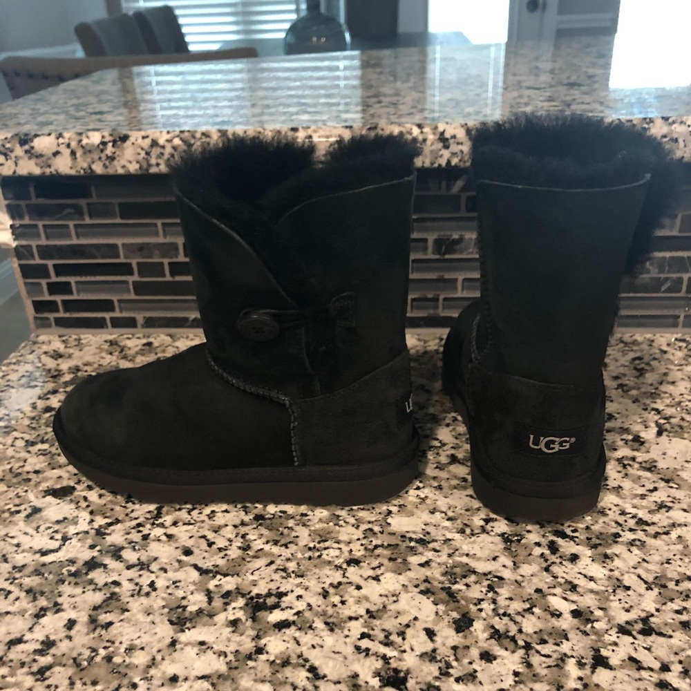 Girl’s black Ugg Boots